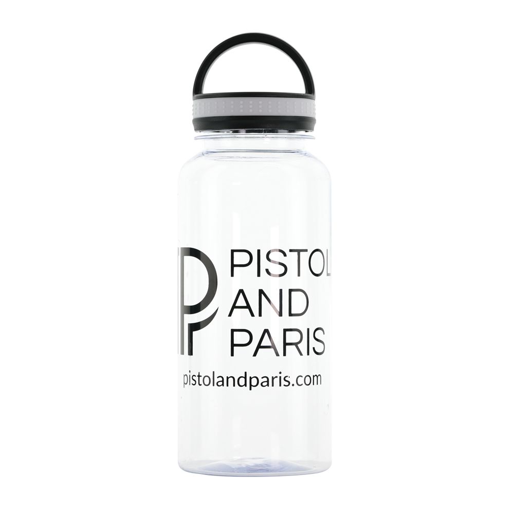 white pistol and paris water bottle